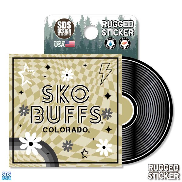 Rugged sticker designed like a vinyl record and sleeve, with a retro "SKO BUFFS COLORADO" graphic in black and gold surrounded by stars, lightning bolt, and flower accents.